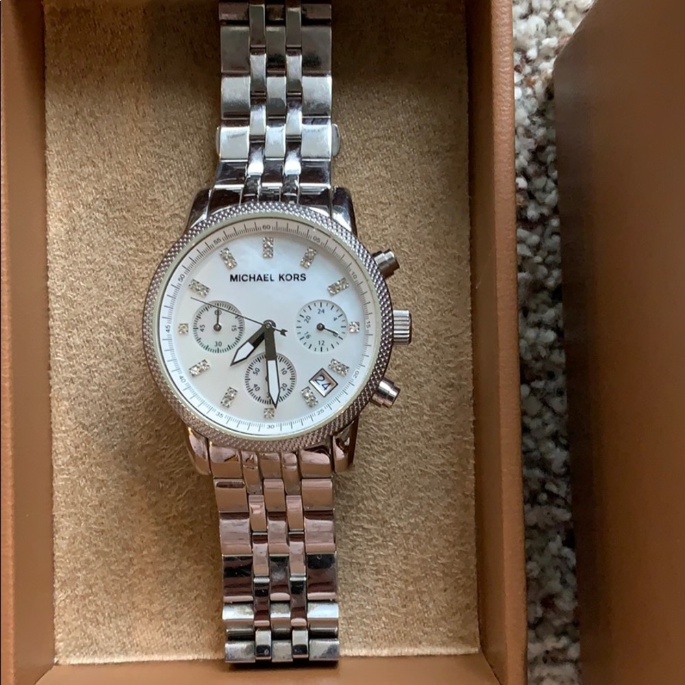 Michael Kors watch. Needs new battery.